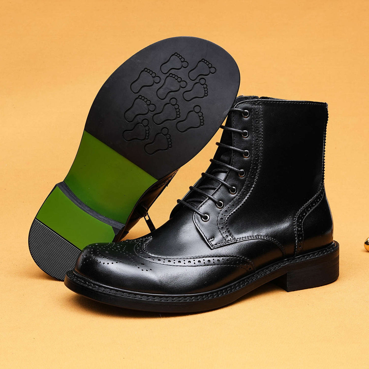 Black leather lace-up formal dress boots with thick sole and textured outsole