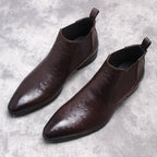 Dark brown leather Chelsea dress boots with elastic side panels and pull tab