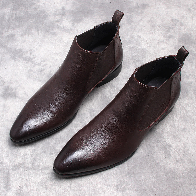 Dark brown leather Chelsea dress boots with elastic side panels and pull tab