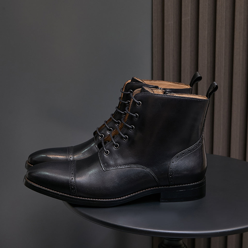 Men's pointed-toe leather dress boot in black, lace-up front with side zipper, ankle height