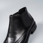 Black genuine leather chelsea dress boot with elastic side gusset and leather upper