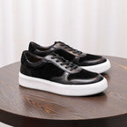 Men's leather sneakers in black, lace-up low-top with white rubber sole