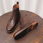 Brown leather side-zip ankle boot pair with lace-up fronts and block heel sole