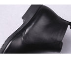 Men's black leather ankle boot with side panel and thick sole