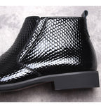 Men's black textured leather ankle boot with side zip and thick sole