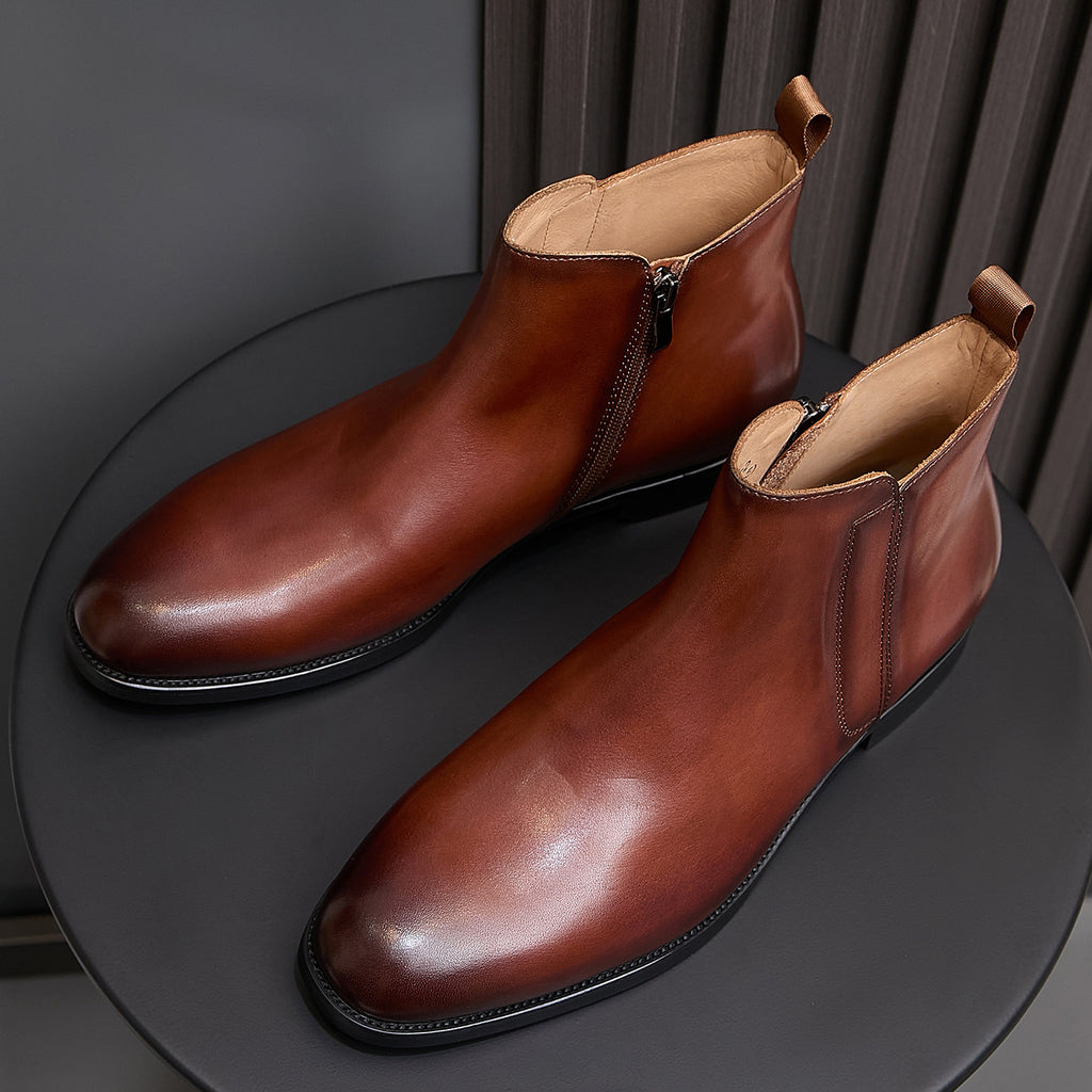 Men's pointed-toe leather dress boots with side zip, dark brown leather on display.