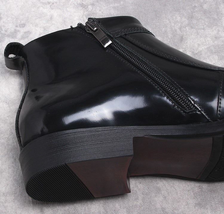 Black leather side-zip boot heel view with thick sole and zipper seam