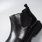 Black leather Chelsea boot upper with elastic gore panel and heel pull tab