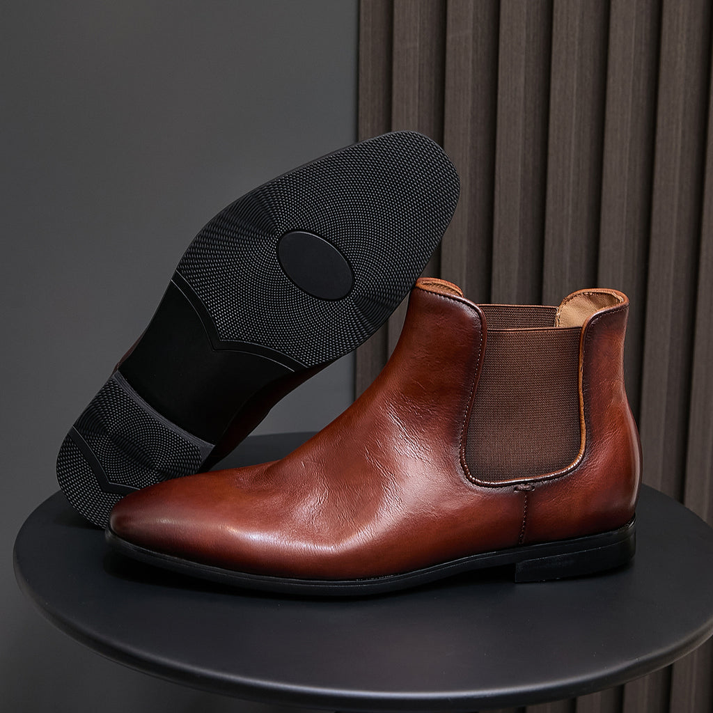 Brown Chelsea dress boots, elastic side panels and black textured outsole
