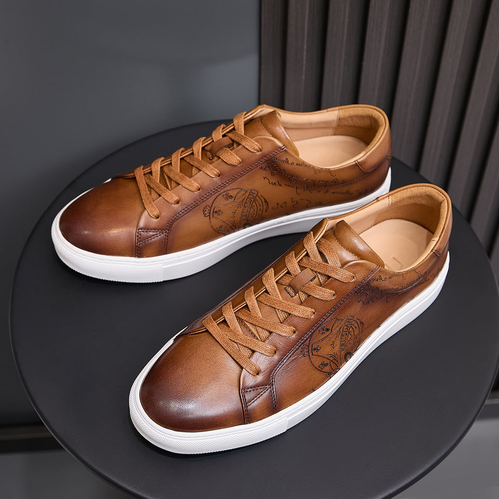 Men's tan leather sneakers angled view with lace-up design and white rubber sole