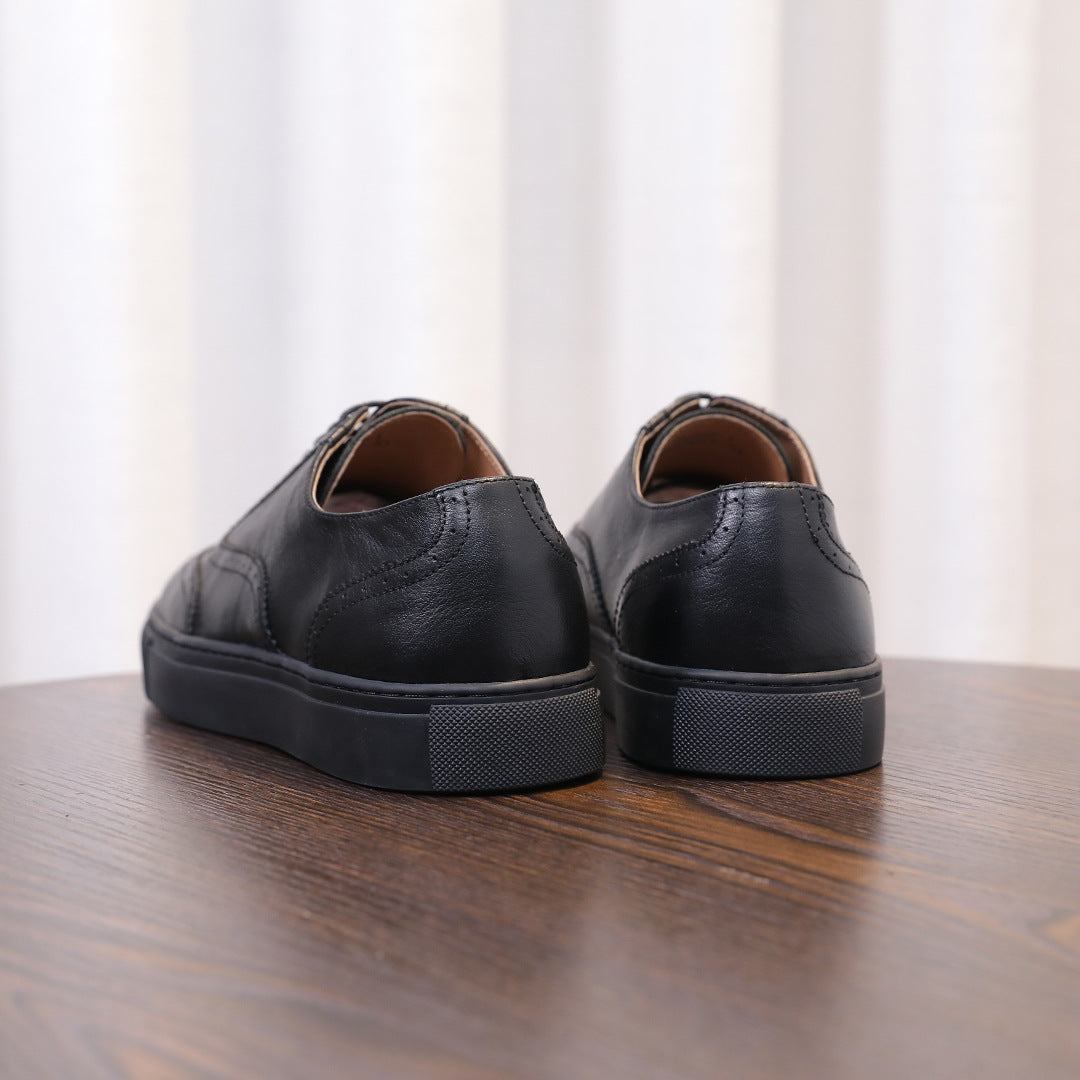 Men's black leather sneakers back view with cushioned heel and rubber sole