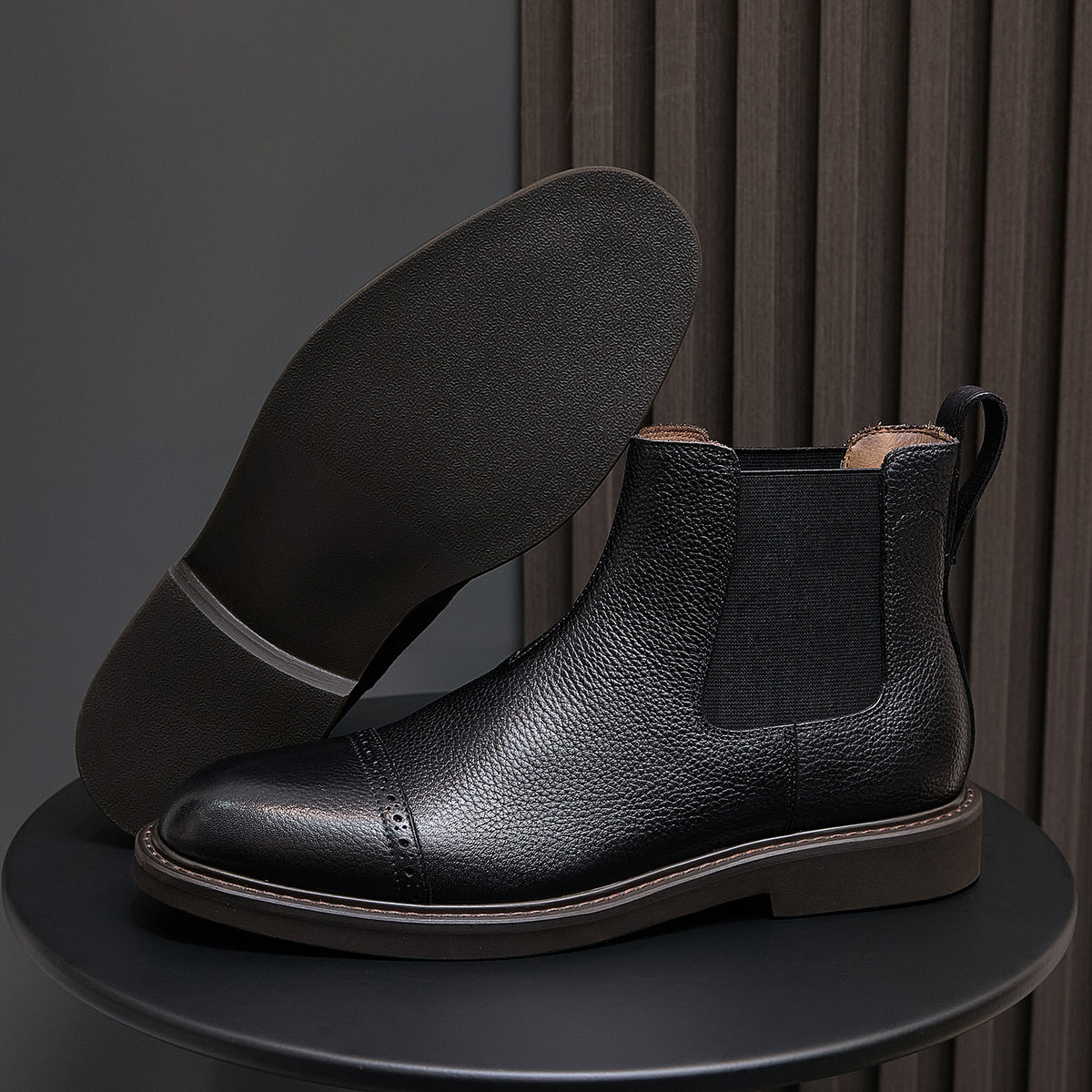 Men's pointed-toe Chelsea dress boots, black leather upper with elastic side gores