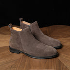 Men's dark gray suede side-zip dress boots with low heel and pointed toe