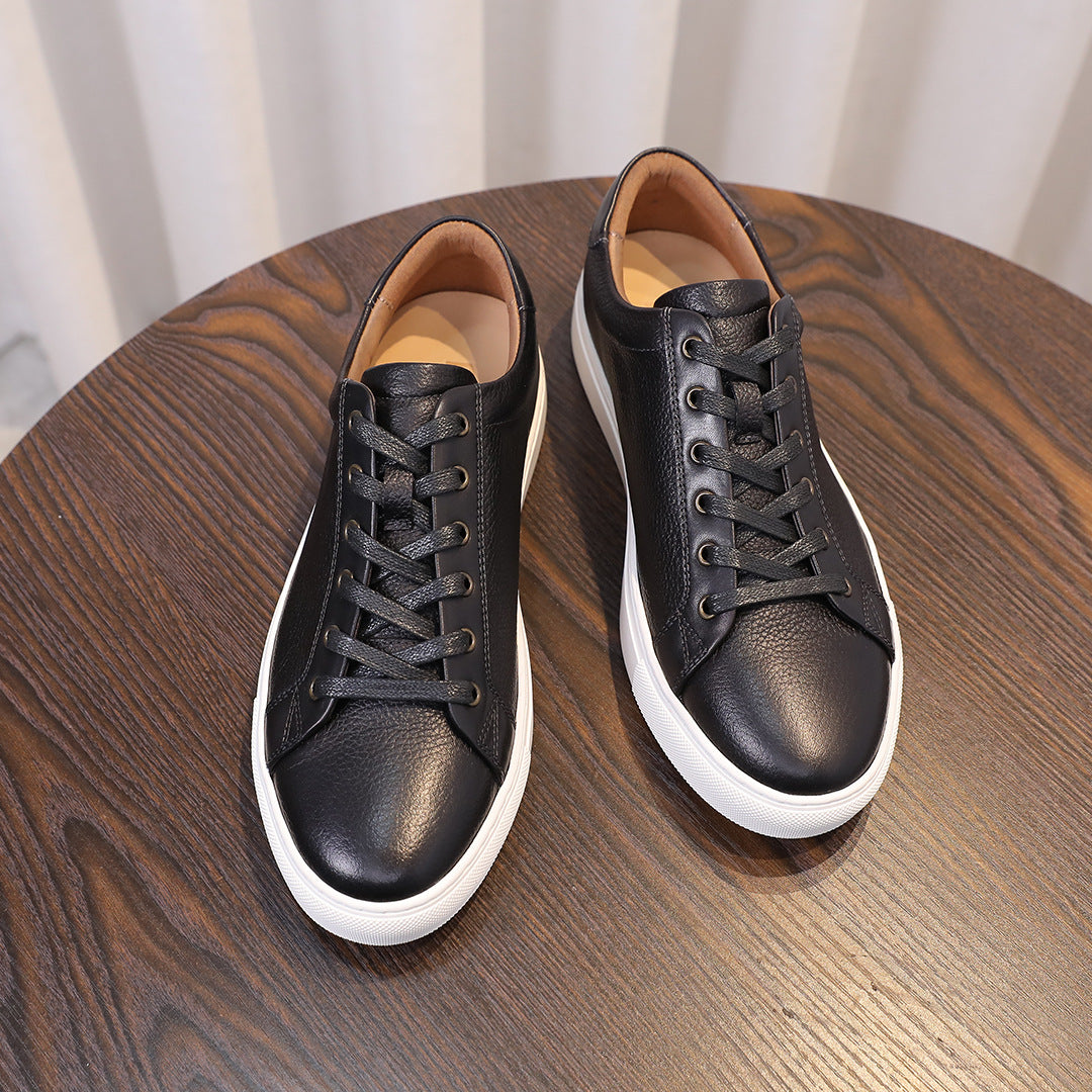 Black genuine leather sneakers, lace-up with white rubber sole and round toe