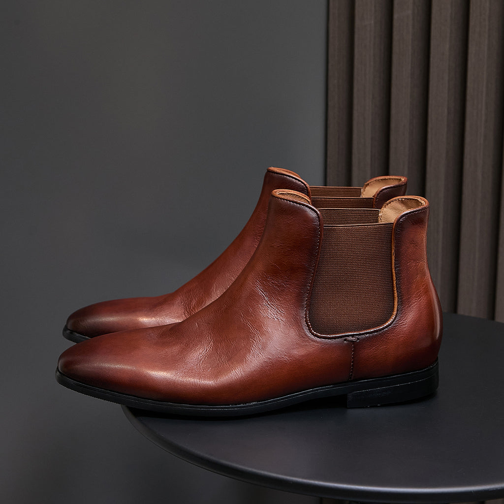 Brown pointed-toe Chelsea dress boot, elastic side panel with tan trim