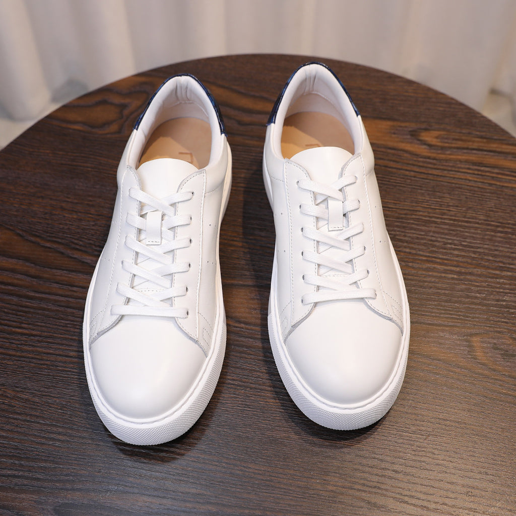 Men's white leather sneakers with lace-up and white rubber sole