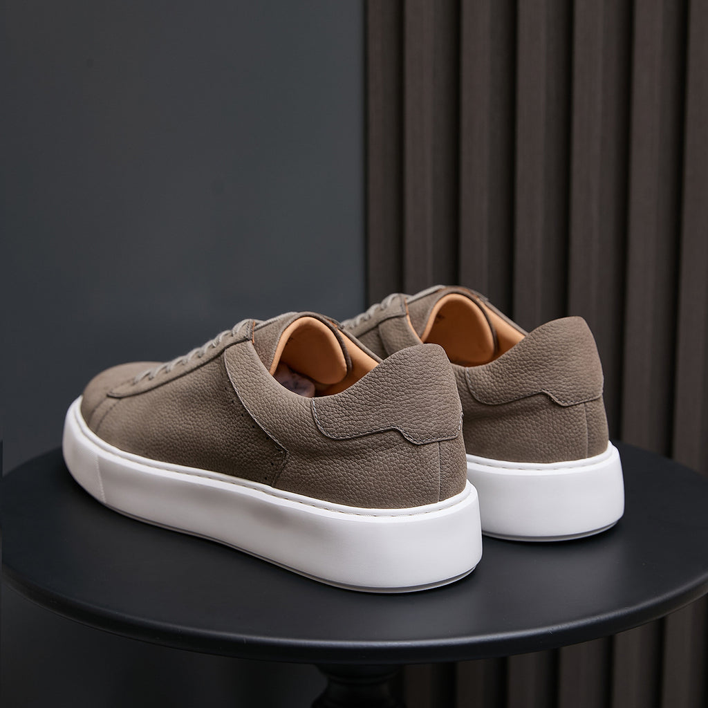 Men's genuine leather sneakers, taupe, rear view showing padded heel and white midsole