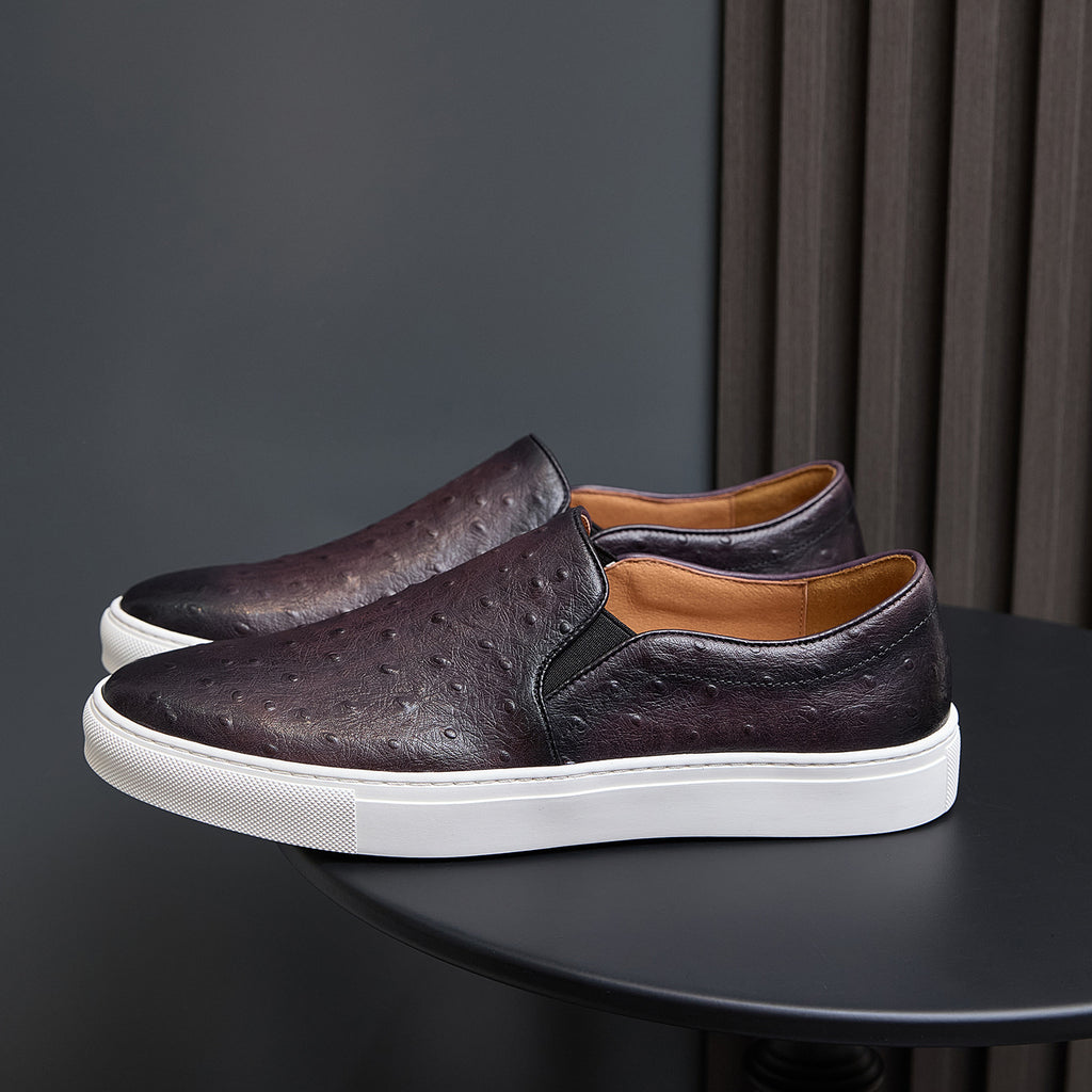 Men's dark purple leather slip-on sneakers with perforated upper and white rubber sole