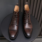 Men's pointed-toe leather dress boots in dark brown, lace-up front with side zipper