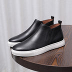 Men's point-toe leather side-zip dress boot, black leather with white sole and brown lining