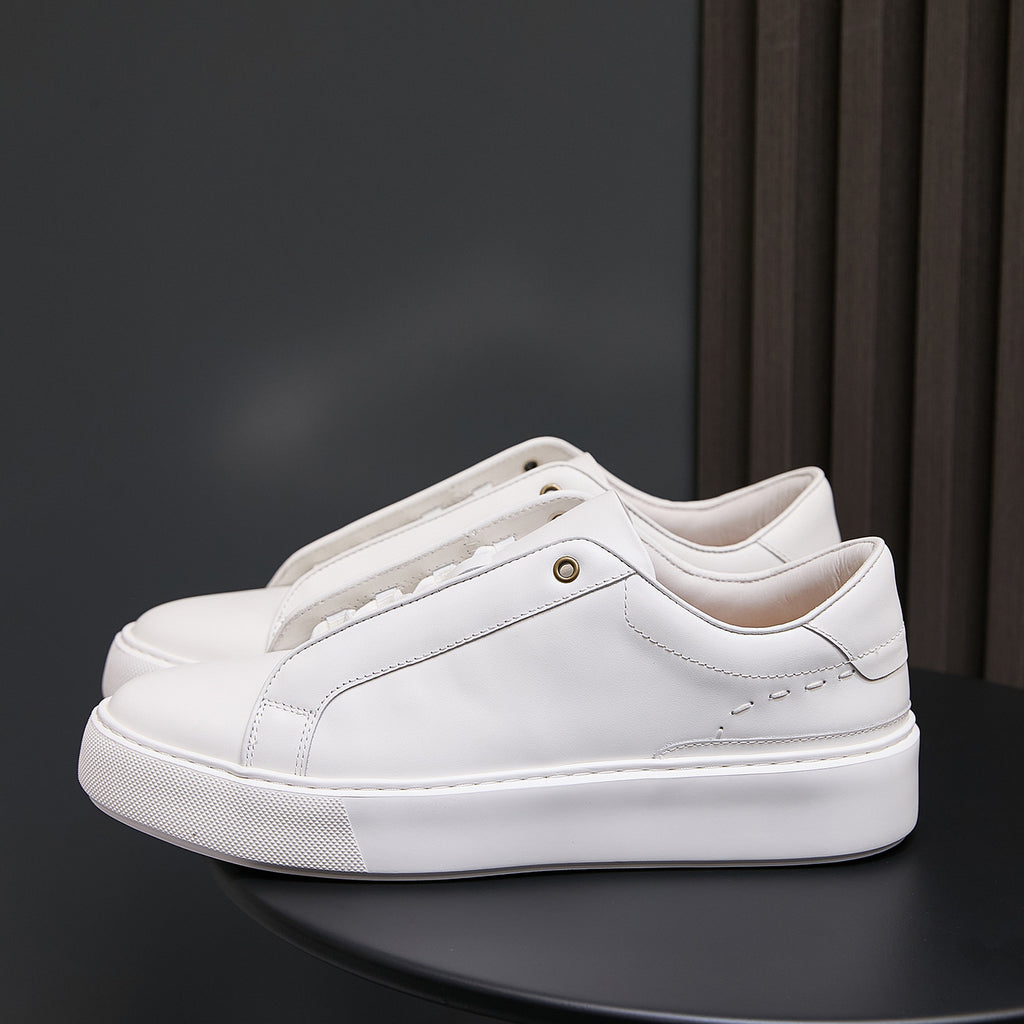 White genuine leather low-top sneakers with lace-up and rubber-textured outsole