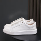 White genuine leather low-top sneakers with lace-up and rubber-textured outsole
