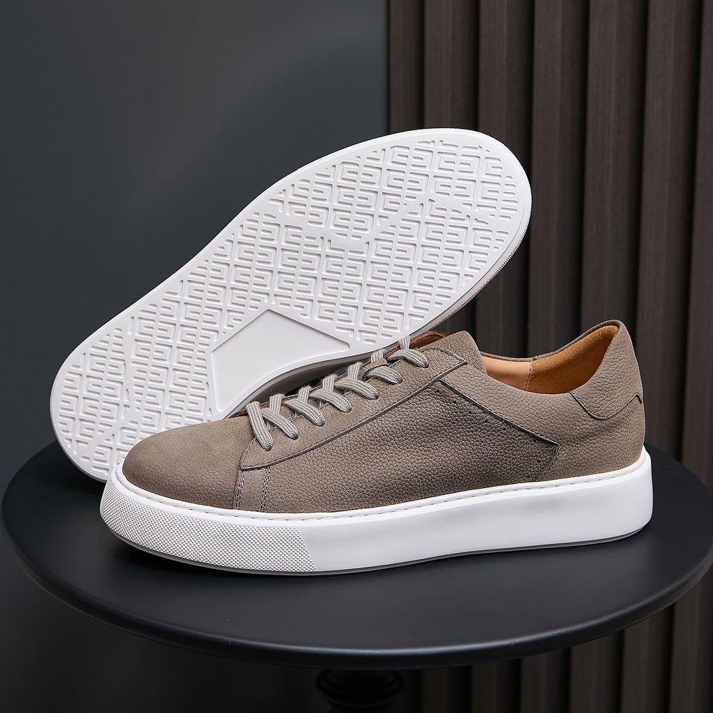 Men's gray leather sneakers, lace-up design with textured white outsole
