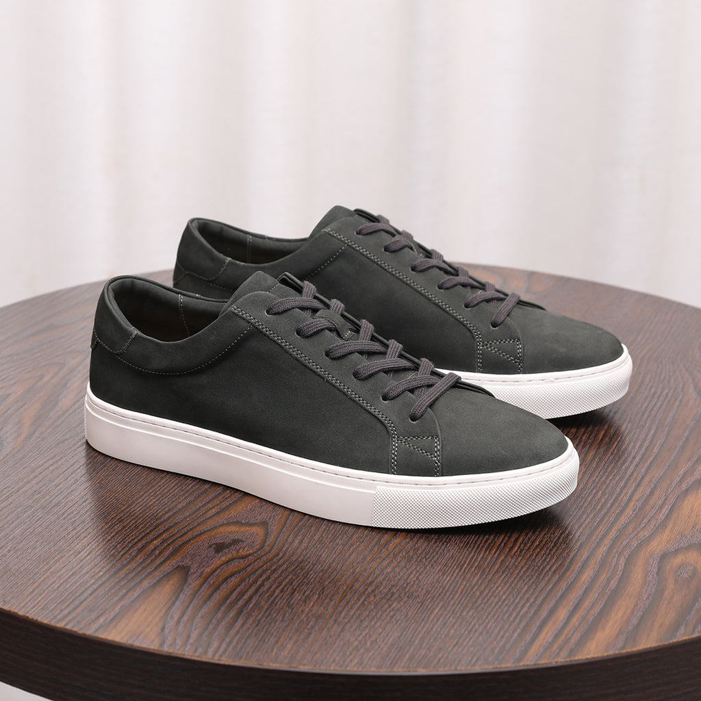Black suede leather sneakers with lace-up front and white rubber sole