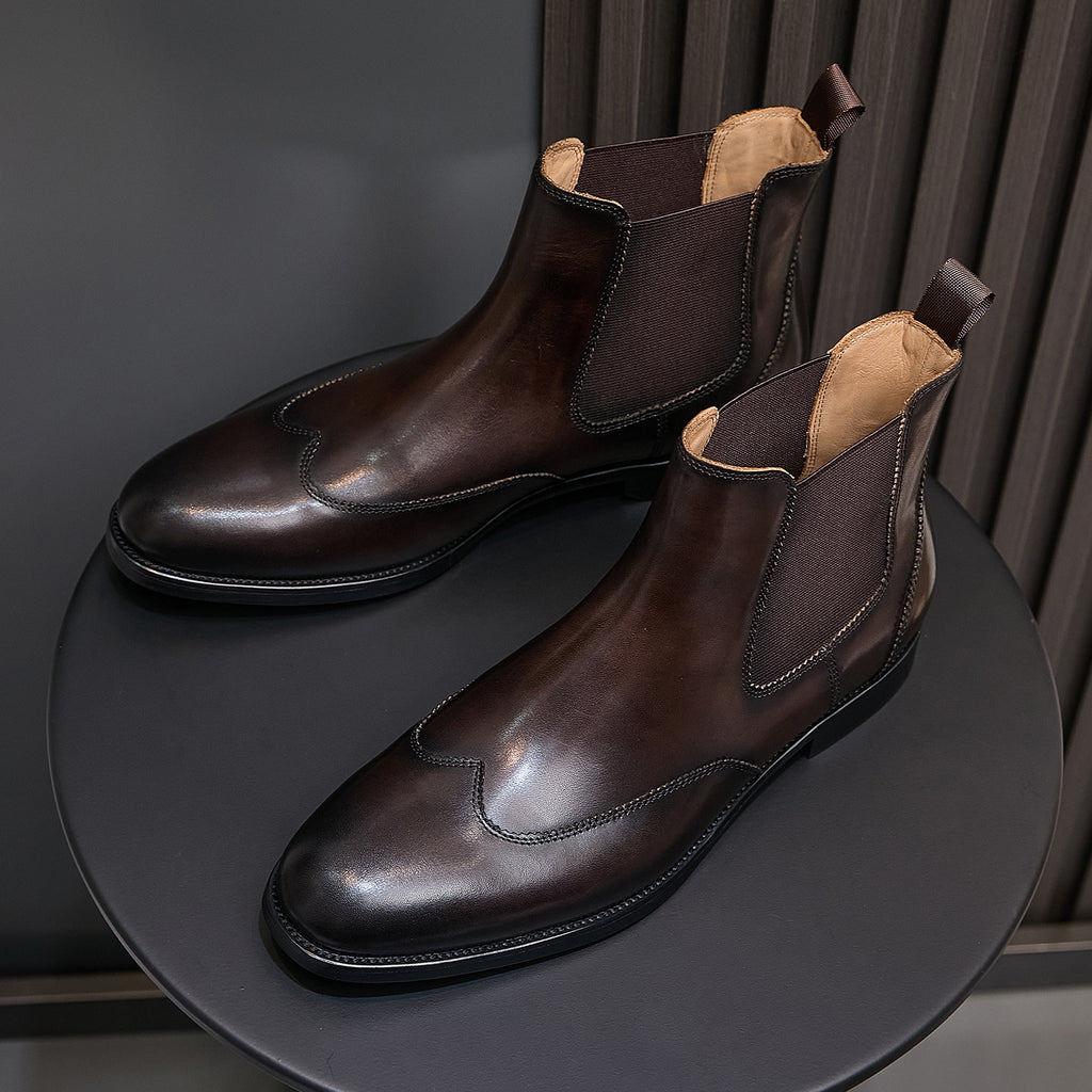 Men's pointed-toe Chelsea dress boots in dark brown, pair view with tan lining