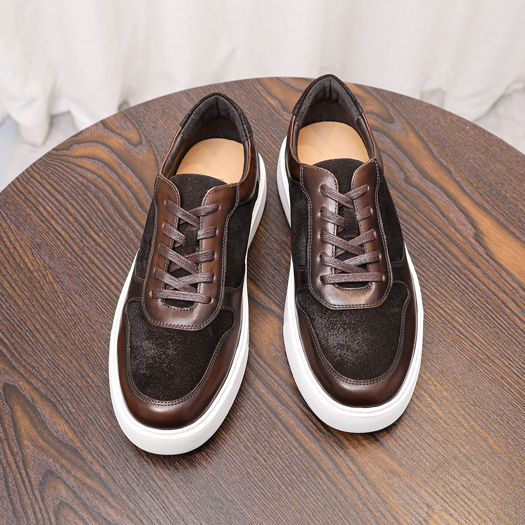 Brown leather sneakers pair, lace-up front view with white rubber sole
