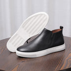 Men's point-toe leather side-zip dress boot, black upper with textured white outsole