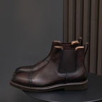 Men's pointed-toe Chelsea dress boots, dark brown upper with elastic gore and stitched welt