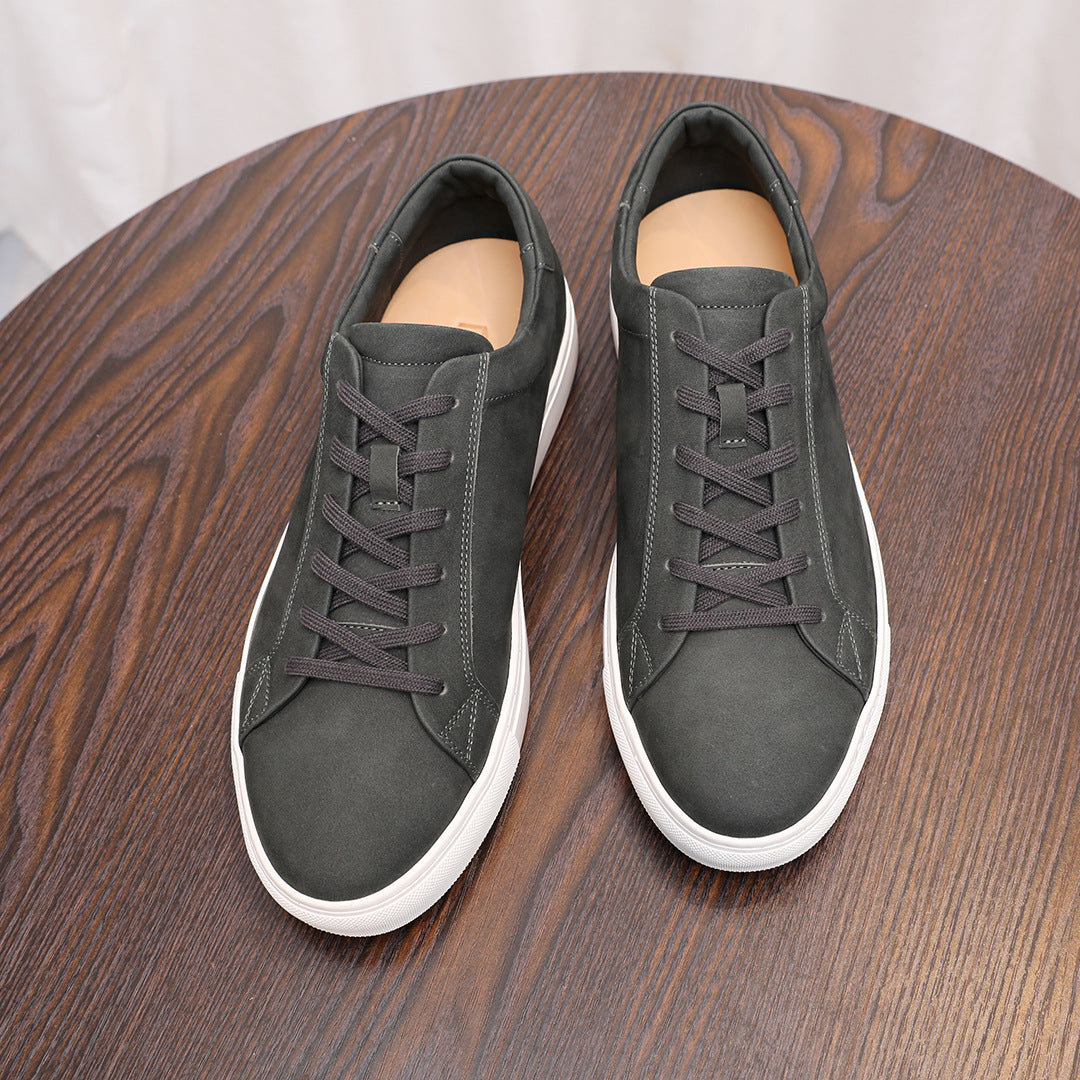Dark gray suede leather sneakers with lace-up front and white cupsoles