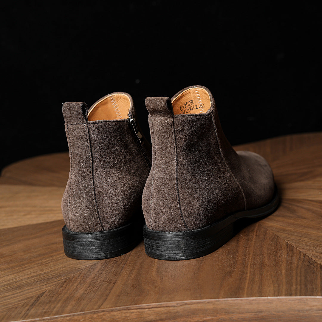 Men's point-toe leather side-zip dress boots in dark brown suede, rear view pair