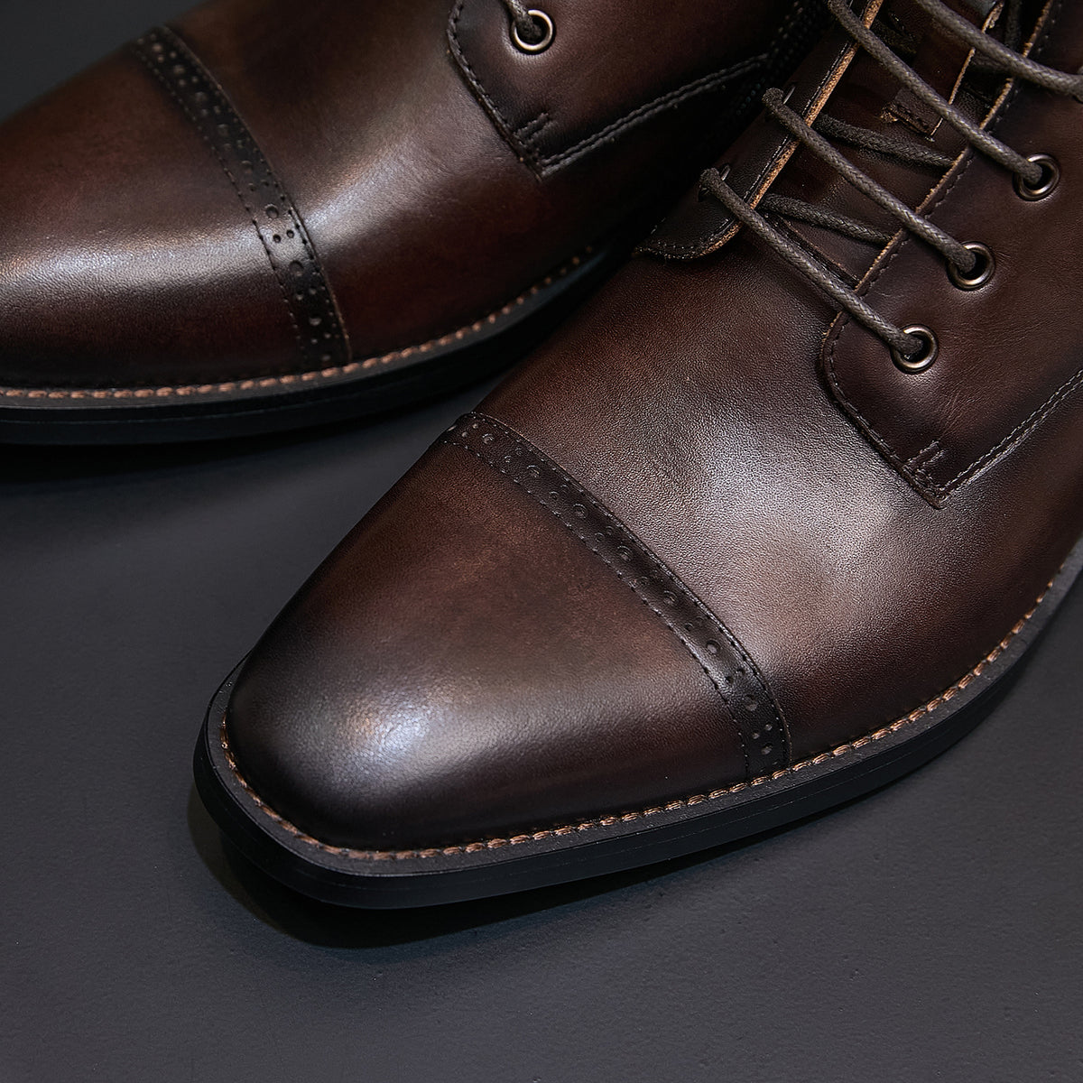 Men's pointed-cap-toe leather dress boots, dark brown, lace-up upper close-up