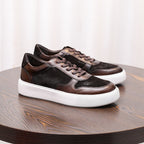 Dark brown leather sneakers, lace-up low-top with white rubber sole