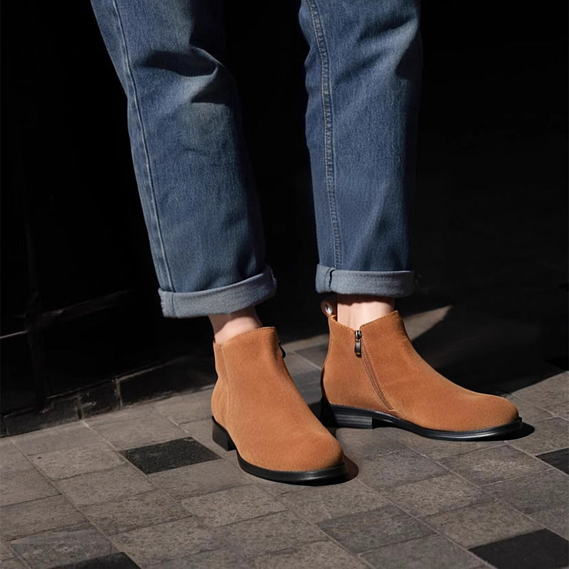 Men's point-toe leather side-zip dress boots in tan suede, with cuffed jeans
