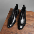 Men's genuine leather Chelsea dress boots, black pair, slip-on ankle boots with stitched toe.