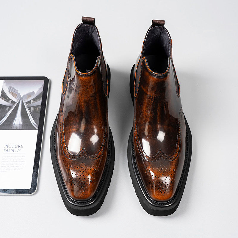 Dark brown leather Chelsea dress boots with elastic side panels and sculpted, chunky outsole