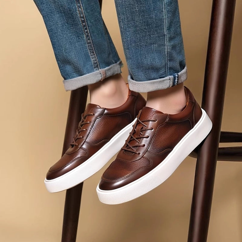 Men's dark brown leather lace-up sneakers with cushioned white soles