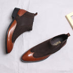 Men's brown suede Chelsea boots with elastic sides and brogue toe overlays