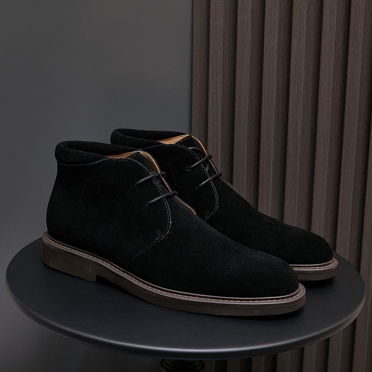 Men's black lace-up chukka boots with plain toe and contrast welt stitching