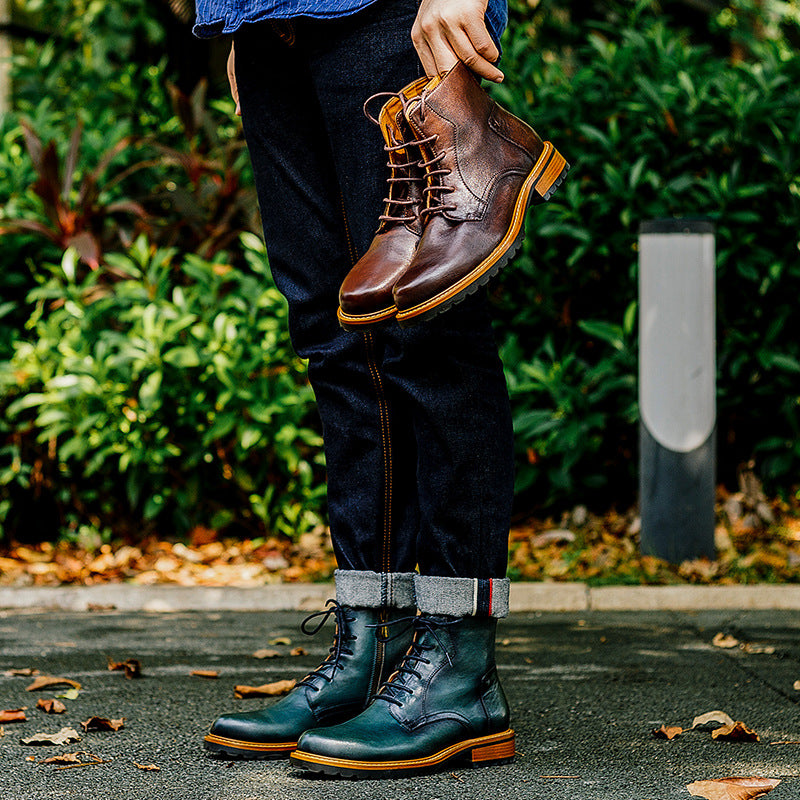 Brown leather lace-up ankle boots with side-zip, worn outdoors while lifting one foot.