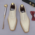 Beige chunky lug-sole brogue Oxford shoes with white laces, top-down pair view