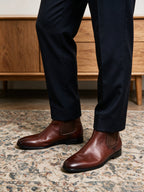 Pointed-toe suede Chelsea dress boots in dark brown with elastic side gore