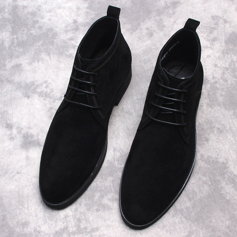 Black lace-up ankle dress boots with round toe and pull tab at heel
