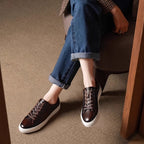 Men's black leather lace-up sneakers with white rubber sole