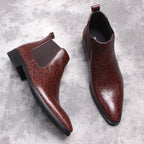 Pair of dark brown leather Chelsea slip-on boots with side elastic gore