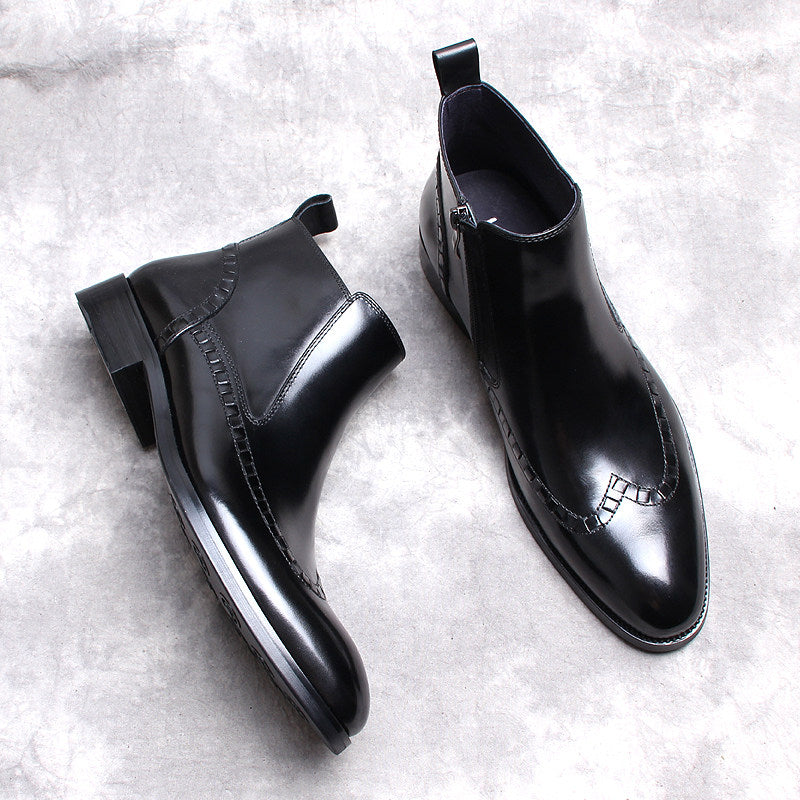 Two black leather side-zip formal boots angled view with thick sole and stitched detail