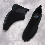 Men's black Chelsea dress boots, side and heel view with elastic gore